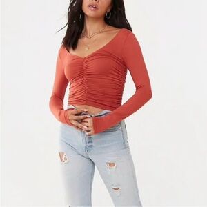 Ruched orange-brown cropped long sleeve